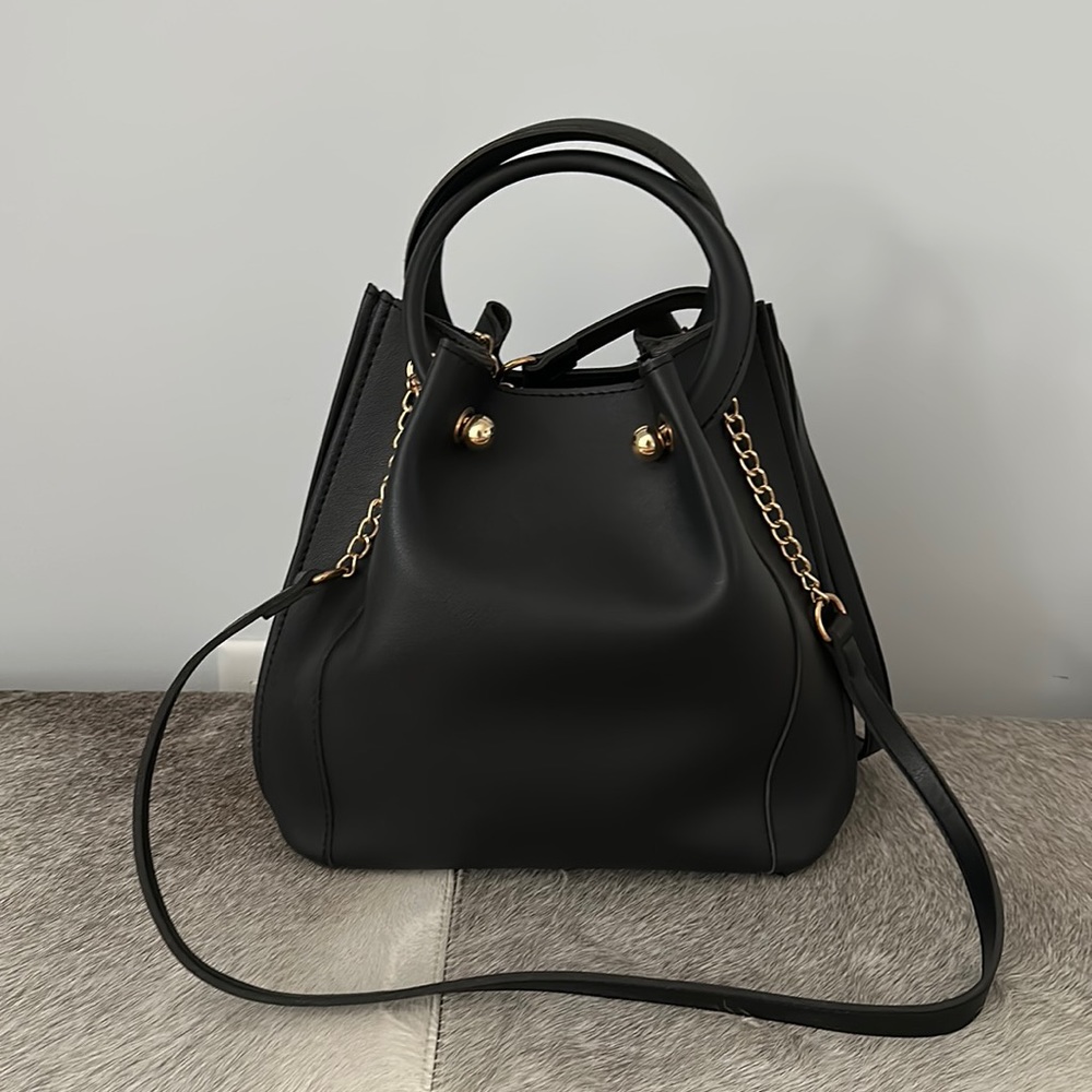 Black bucket bag with gold hardware